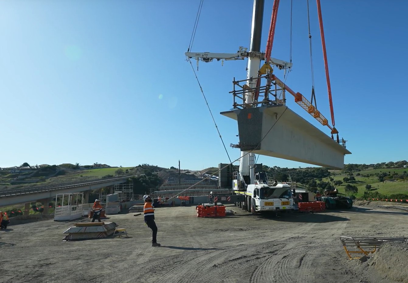Pedler Creek Bridge super T being lifted by a crane