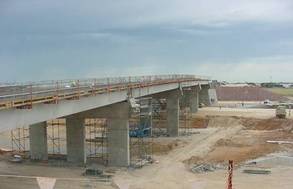 Installation of 4 of the 5 bridge spans on Elder Smith Road bridge over the railway lines in October 2005.