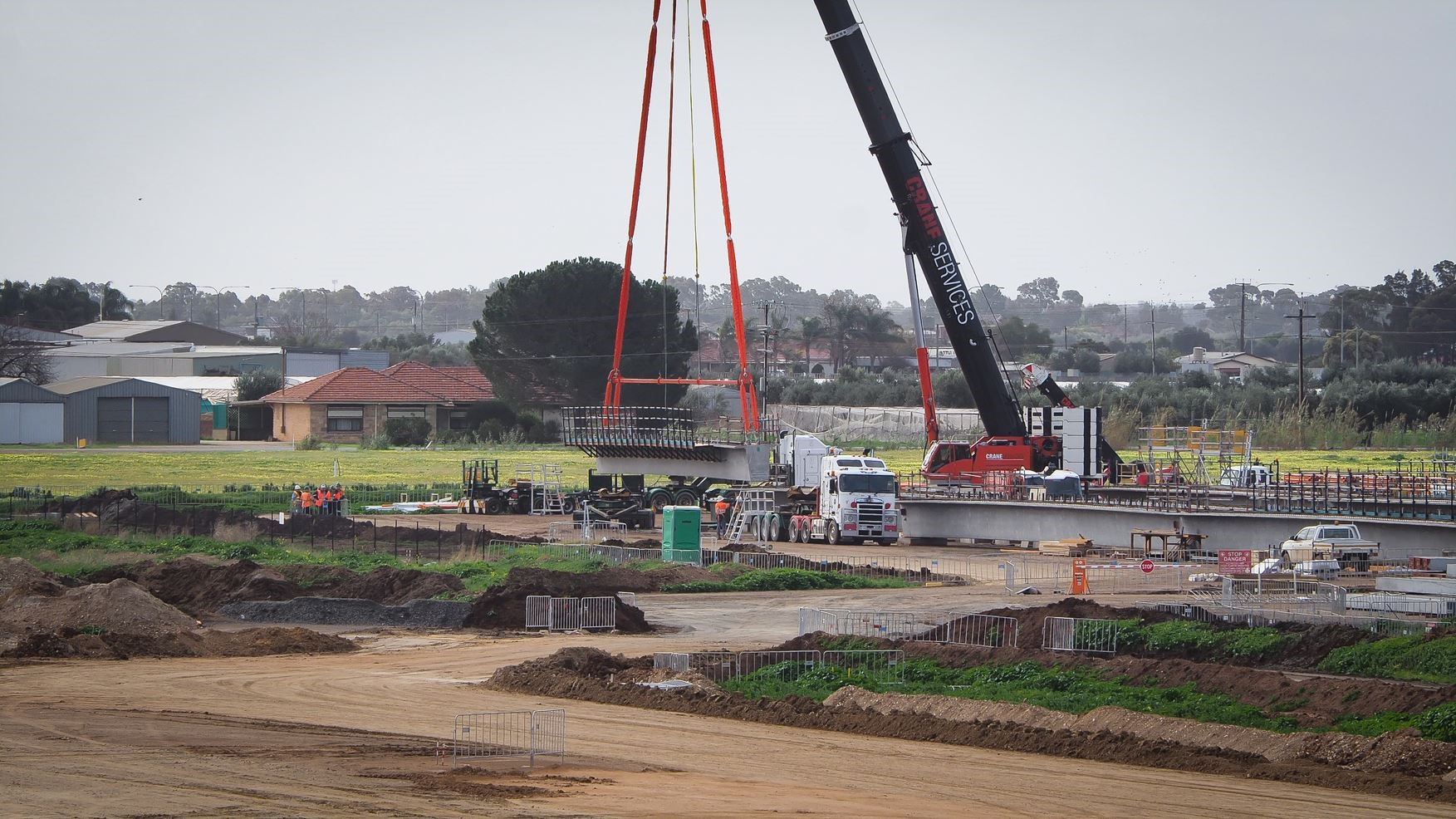 Super T Beams being craned in to build the Waterloo Corner bridge - October 2018