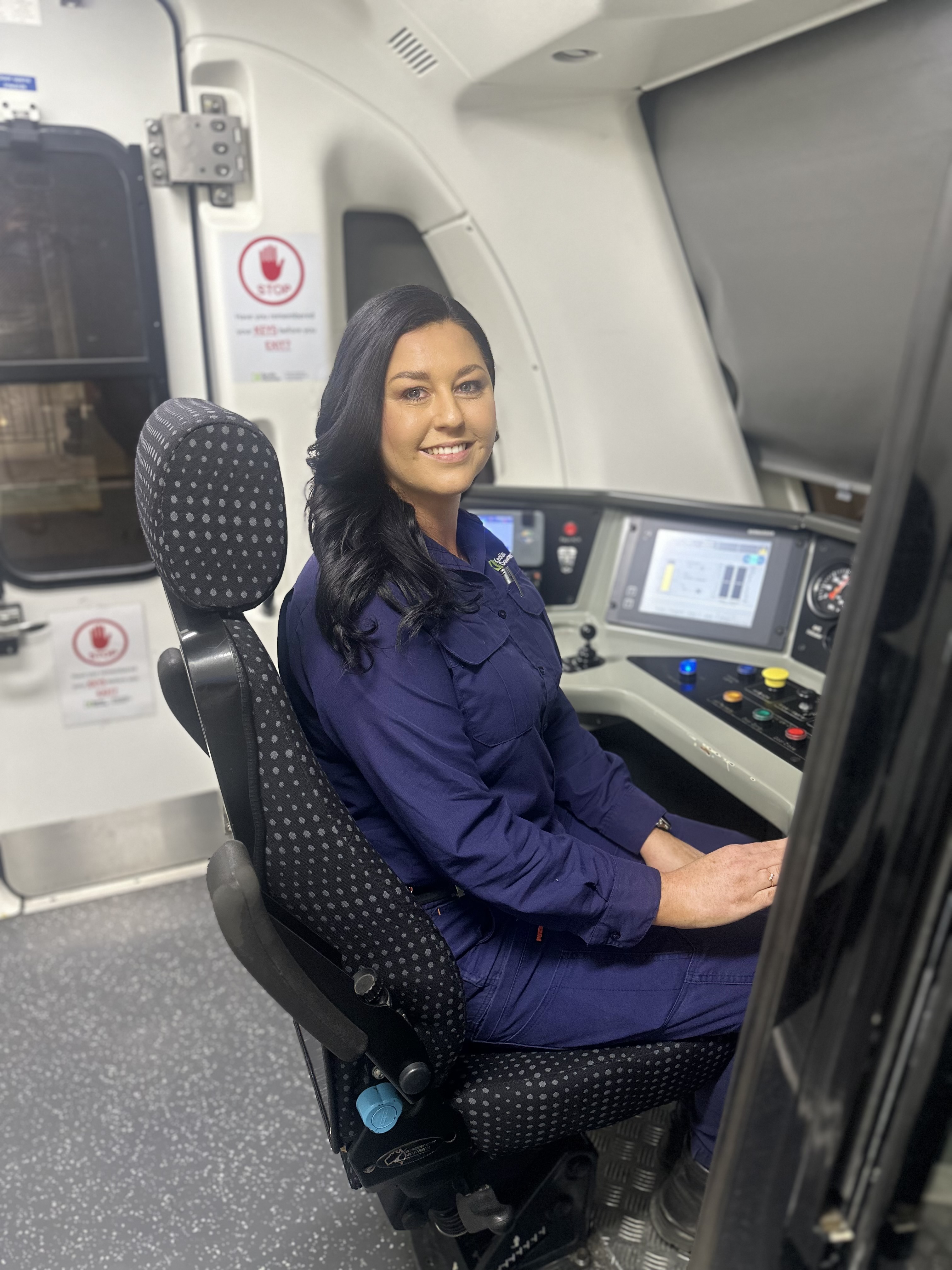 Train driver Rhiannon Godlevski sits in the cab