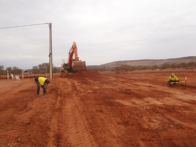 Two men working on a new road