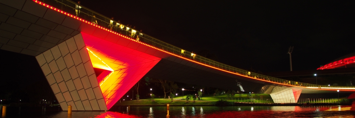 Riverbank bridge at night time